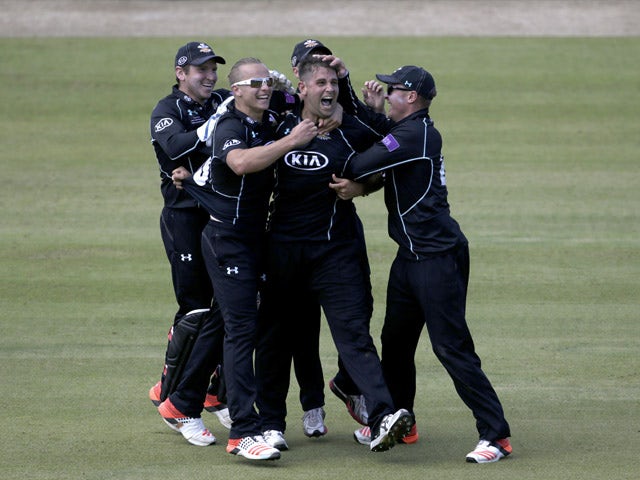 Jade Dernbach of Surrey celebrates the wicket of David Payne of Gloustershire during the Royal London One-Day Cup Final between Surrey and Gloustershire at Lord's Cricket Ground on September 19, 2015