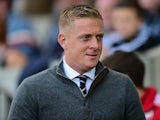 Garry Monk Manager of Swansea City looks on during the Barclays Premier League match between Swansea City and Everton at the Liberty Stadium on September 19, 2015 in Swansea, United Kingdom
