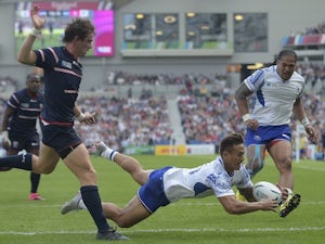 Samoa's Tim Nanai-Williams scores a try during the Rugby World Cup game with the USA on September 20, 2015
