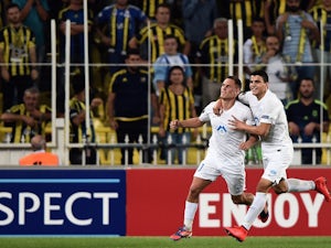 Molde's Tommy Hoiland (L) celebrates with a teammate after scoring a goal during the Europa League football match between Fenerbahce and Molde on September 17, 2015 at the Ulker Fenerbahce Sukru saracoglu stadium in istanbul.