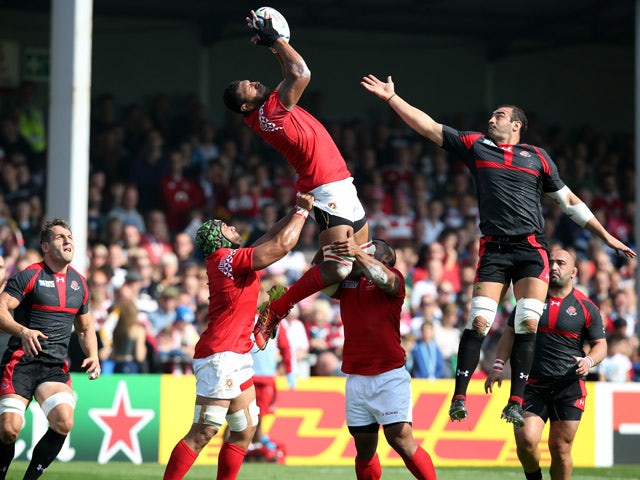 Steve Mafi of Tonga leaps for a high ball chalenged by Mamuka Gorgodze of Georgia during the Group C: Rugby World Cup match between Tonga and Georgia at Kingsholm Stadium Stadium on September 19, 2015