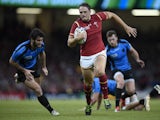 Wales' centre Cory Allen (C) runs in to score his second and Wales's third try during the Pool A match of the 2015 Rugby World Cup between Wales and Uruguay at the Millennium Stadium in Cardiff, south Wales, on September 20, 2015