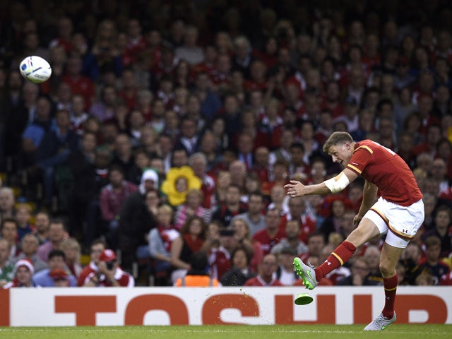 Wales' fly half Rhys Priestland kicks a conversion during the Pool A match of the 2015 Rugby World Cup between Wales and Uruguay at the Millennium Stadium in Cardiff, south Wales, on September 20, 2015