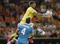 Zenit's goalkeeper Yury Lodygin (top) vies with Valencia's German defender Shkodran Mustafi (R) during the UEFA Champions League group H football match Valencia CF vs FC Zenit at the Mestalla stadium in Valencia on September 16, 2015