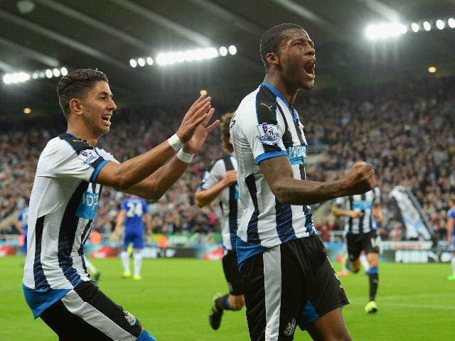Georginio Wijnaldum (R) of Newcastle United celebrates scoring his team's second goal with his team mate Ayoze Perez (L) during the Barclays Premier League match between Newcastle United and Chelsea at St James' Park on September 26, 2015 in Newcastle upo