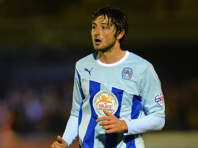 Adam Barton of Coventry City in action during the FA Cup First Round match between AFC Wimbledon and Coventry City at The Cherry Red Records Stadium on November 8, 2013 in Kingston upon Thames, England