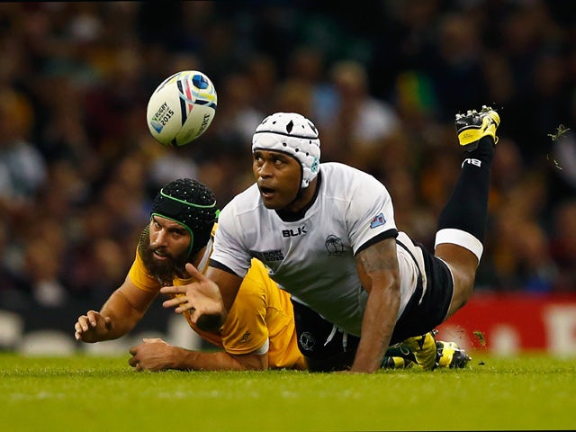 Akapusi Qera of Fiji dives to gather the ball during the 2015 Rugby World Cup Pool A match between Australia and Fiji at the Millennium Stadium on September 23, 2015