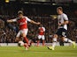 Mathieu Flamini of Arsenal scores their first goal as Kevin Wimmer of Tottenham Hotspur looks on during the Capital One Cup third round match between Tottenham Hotspur and Arsenal at White Hart Lane on September 23, 2015
