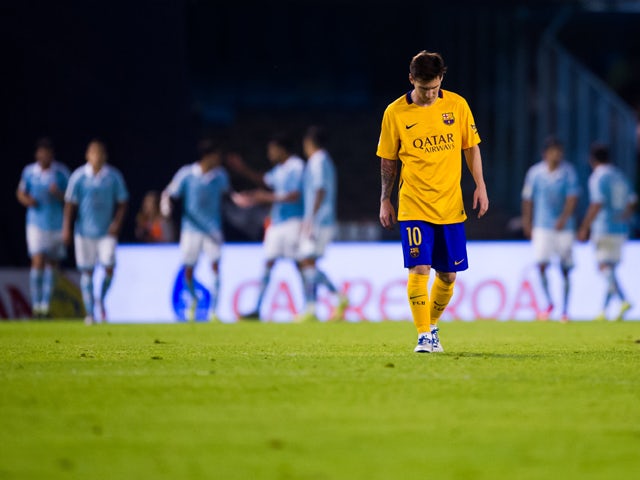 Lionel Messi of FC Barcelona looks dejected after John Guidetti of Celta Vigo scored his team's fourth goal during the La Liga match between Celta Vigo and FC Barcelona at Estadio Balaidos on September 23, 2015