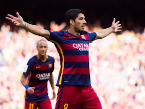 Suarez brace secures victory for Barca
