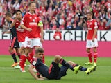 Bayern Munich's midfielder Thomas Muller misses a penalty during the German first division Bundesliga football match 1 FSV Mainz 05 vs FC Bayern Muenchen in Mainz, southern Germany, on September 26, 2015