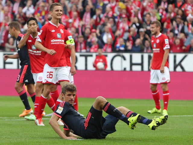 Bayern Munich's midfielder Thomas Muller misses a penalty during the German first division Bundesliga football match 1 FSV Mainz 05 vs FC Bayern Muenchen in Mainz, southern Germany, on September 26, 2015