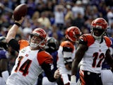 Quarterback Andy Dalton #14 of the Cincinnati Bengals celebrates with wide receiver Mohamed Sanu #12 of the Cincinnati Bengals after scoring a first quarter touchdown during a game against the Baltimore Ravens at M&T Bank Stadium on September 27, 2015 in 