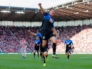 Dan Gosling of Bournemouth celebrates scoring his team's first goal during the Barclays Premier League match between Stoke City and A.F.C. Bournemouth at Britannia Stadium on September 26, 2015