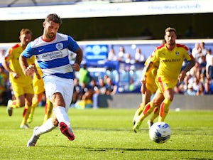 Charlie Austin of QPR scores his sides fourth goal from the penalty spot during the Sky Bet Championship match between Queens Park Rangers and Rotherham United at Loftus Road on August 22, 2015