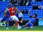 Jordan Cousins of Charlton Athletic is tackled by Fabio of Cardiff City during the Sky Bet Championship match between Cardiff City and Charlton Athletic at the Cardiff City Stadium on September 26, 2015