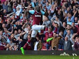 Cheikhou Kouyate of West Ham United celebrates scoring his team's second goal during the Barclays Premier League match between West Ham United and Norwich City at the Boleyn Ground on September 26, 2015