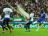 Chelsea's Brazilian midfielder Ramires (R) shoots to score their first goal during the English Premier League football match between Newcastle United and Chelsea at St James' Park in Newcastle-upon-Tyne, north east England, on September 26, 2015. 