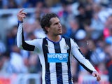Daryl Janmaat of Newcastle United celebrates scoring his team's first goal during the Barclays Premier League match between Newcastle United and Watford at St James' Park on September 19, 2015