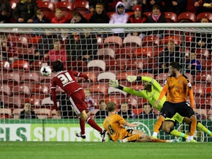 Diego Fabbrini of Middlesbrough shoots past Carl Ikeme, Goalkeeper of Wolverhampton Wanderers for the second goal during the Capital One Cup third round match between Middlesbrough and Wolverhampton Wanderers at Riverside Stadium on September 22, 2015 in 