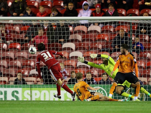 Diego Fabbrini of Middlesbrough shoots past Carl Ikeme, Goalkeeper of Wolverhampton Wanderers for the second goal during the Capital One Cup third round match between Middlesbrough and Wolverhampton Wanderers at Riverside Stadium on September 22, 2015 in 