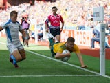 Drew Mitchell of Australia dives over to score their seventh try during the 2015 Rugby World Cup Pool A match between Australia and Uruguay at Villa Park on September 27, 2015