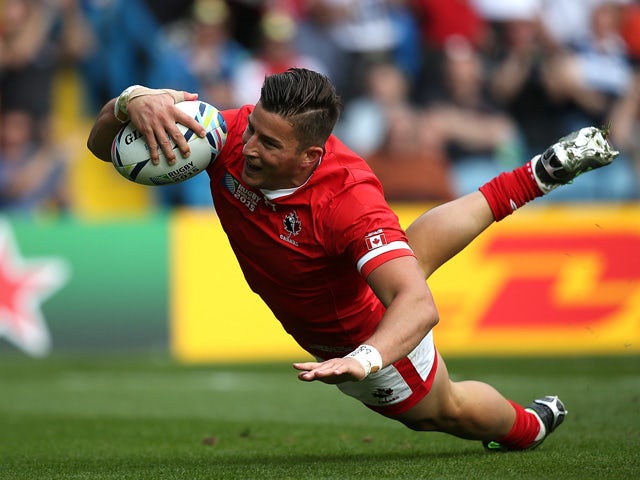D.T.H van der Merwe of Canada goes over for the opening try during the 2015 Rugby World Cup Pool D match between Italy and Canada at Elland Road on September 26, 2015