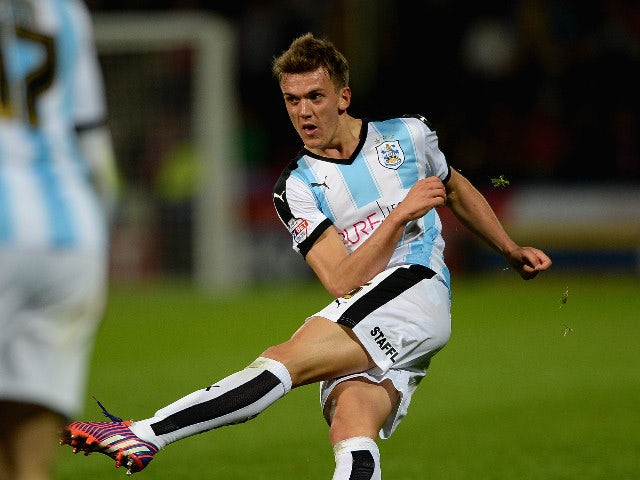Emyr Huws of Huddersfield Town scores his team's first goal during the Sky Bet Championship match between Huddersfield Town and Nottingham Forest at John Smiths Stadium on September 24, 2015 in Huddersfield, England.