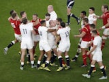 England and Wales players scuffle during their Rugby World Cup encounter on September 26, 2015