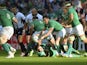 Ireland's scrum half Eoin Reddan (C) passes the ball during a Pool D match of the 2015 Rugby World Cup between Ireland and Romania at Wembley stadium, north London, on September 27, 2015