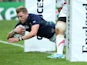 Finn Russell of Scotland dives over for a try during the 2015 Rugby World Cup Pool B match between Scotland and Japan at Kingsholm Stadium on September 23, 2015