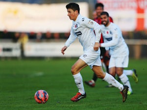 John Oster of Gateshead in action during the FA Cup first round match between Norton United and Gateshead at Smallthorne on November 9, 2014 in Stoke on Trent, England.