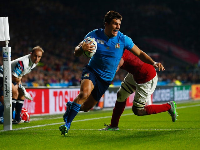 Giovanbattista Venditti of Italy scores his team's first try during the 2015 Rugby World Cup Pool D match between France and Italy at Twickenham Stadium on September 19, 2015
