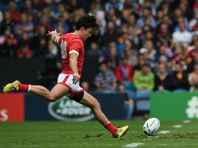 Canada's fly half Nathan Hirayama kicks a penalty during a Pool D match of the 2015 Rugby World Cup between Italy and Canada at Elland Road in Leeds, north England, on September 26, 2015.