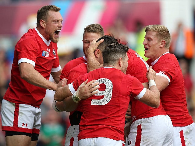 D. T. H. van der Merwe of Canada celebrates his try with team mates during the 2015 Rugby World Cup Pool D match between Italy and Canada at Elland Road on September 26, 2015 in Leeds, United Kingdom. 