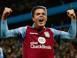Jack Grealish of Aston Villa celebrates after Rudy Gestede of Aston Villa scored during the Capital One Cup third round match between Aston Villa and Birmingham City at Villa Park on September 22, 2015 in Birmingham, England.