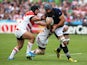 Josh Strauss of Scotland is tackled during the 2015 Rugby World Cup Pool B match between Scotland and Japan at Kingsholm Stadium on September 23, 2015