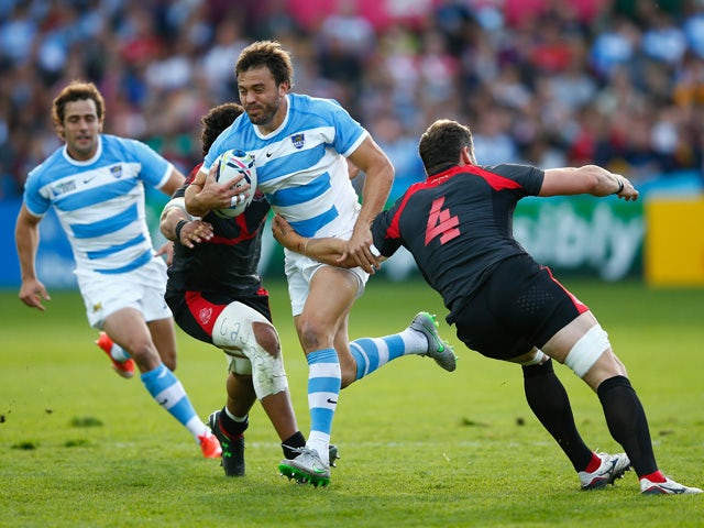 an Martin Hernandez of Argentina goes past Giorgi Nemsadze of Georgia during the 2015 Rugby World Cup Pool C match between Argentina and Georgia at Kingsholm Stadium on September 25, 2015