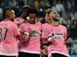 Juventus' forward from Italy Simone Zaza (R) celebrates after scoring a goal during the Serie A football match Juventus vs Frosinione at 'Juventus Stadium' in Turin on September 23, 2015