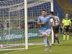 Lazio put two past nine-man Genoa