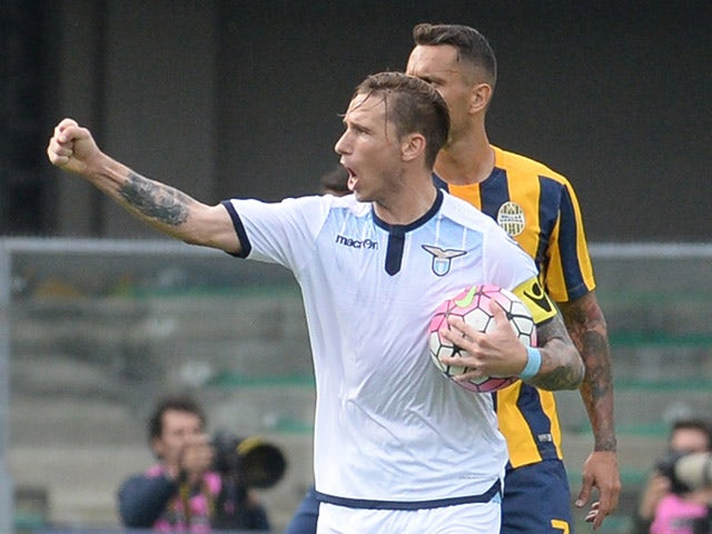 Lucas Biglia of SS Lazio celebrates after scoring his team's first goal from the penalty spot during the Serie A match between Hellas Verona FC and SS Lazio at Stadio Marc'Antonio Bentegodi on September 27, 2015