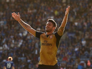 Olivier Giroud of Arsenal celebrates scoring his team's fifth goal during the Barclays Premier League match between Leicester City and Arsenal at The King Power Stadium on September 26, 2015 in Leicester, United Kingdom.