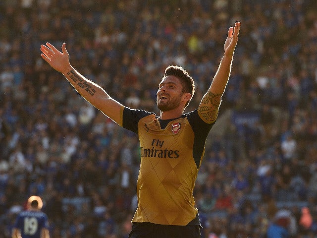 Olivier Giroud of Arsenal celebrates scoring his team's fifth goal during the Barclays Premier League match between Leicester City and Arsenal at The King Power Stadium on September 26, 2015 in Leicester, United Kingdom.