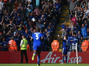 Jamie Vardy of Leicester City celebrates scoring his team's first goal during the Barclays Premier League match between Leicester City and Arsenal at The King Power Stadium on September 26, 2015 in Leicester, United Kingdom.