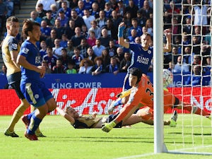 Jamie Vardy of Leicester City scores his team's first goal past Petr Cech of Arsenal during the Barclays Premier League match between Leicester City and Arsenal at The King Power Stadium on September 26, 2015 in Leicester, United Kingdom.