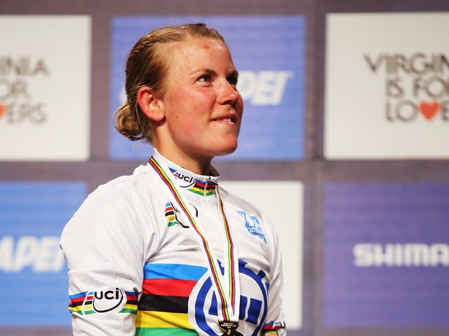 Linda Melanie Villumsen of New Zealand stands on the podium after winning the Women's Elite Individual Time Trial during day three of the UCI Road World Championships on September 22, 2015