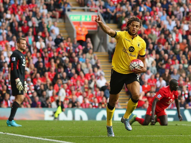 Rudy Gestede of Aston Villa celebrates scoring his team's second goal during the Barclays Premier League match between Liverpool and Aston Villa at Anfield on September 26, 2015 in Liverpool, United Kingdom.