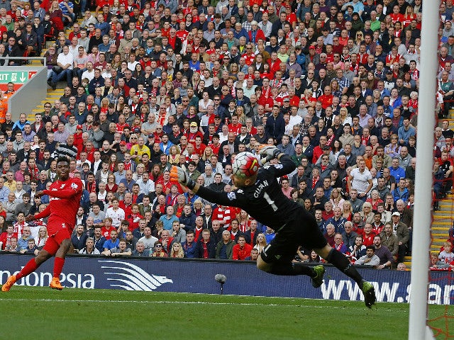 Liverpool's English striker Daniel Sturridge (2nd L) scores his team's second goal during the English Premier League football match between Liverpool and Aston Villa at the Anfield stadium in Liverpool, north-west England, on September 26, 2015. 