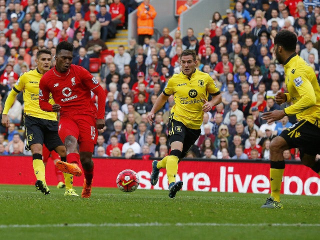 Liverpool's English striker Daniel Sturridge (2nd L) scores his team's third goal during the English Premier League football match between Liverpool and Aston Villa at the Anfield stadium in Liverpool, north-west England on September 26, 2015.