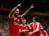 Juan Mata of Manchester United celebrates scoring his team's third goal during the Barclays Premier League match between Manchester United and Sunderland at Old Trafford on September 26, 2015 in Manchester, United Kingdom.